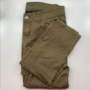 Used green low waisted skinny jeans